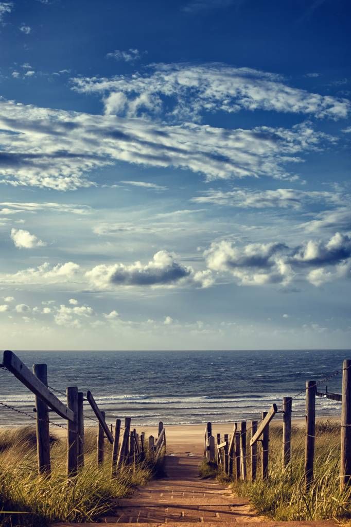 Strand mit Wolken